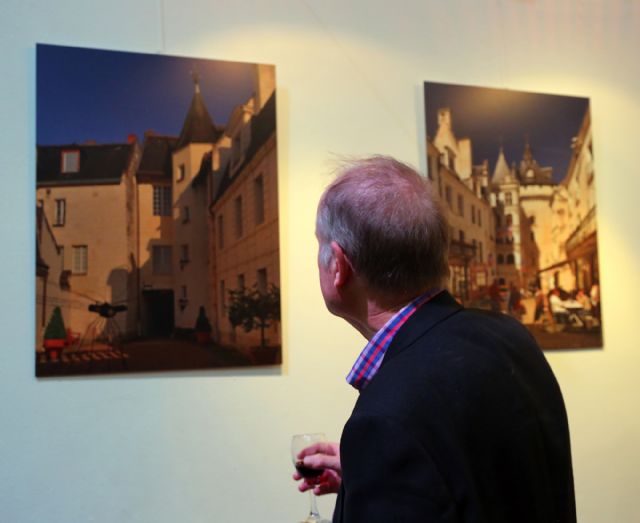 Admiring the photographs from Loches Admiring the photographs from Loches